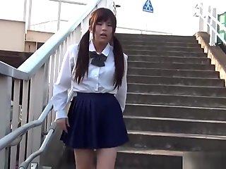 Uniformed Asian Wears Toy