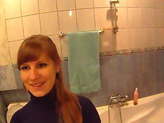 Redhead teen sucks and fucks her boyfriend in the bathroom