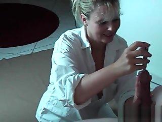 Sexy MILF gives sounding handjob
