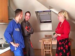 Two repairmen fuck big tits grandma