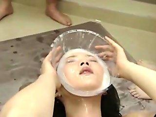 Foxy Asian teen babe drinks huge jizz load from a cup