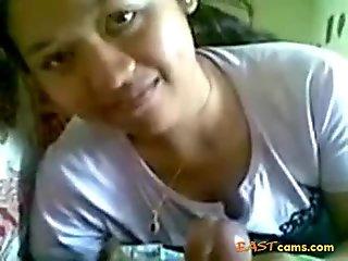 indonesian babe gives bj till hubby cums